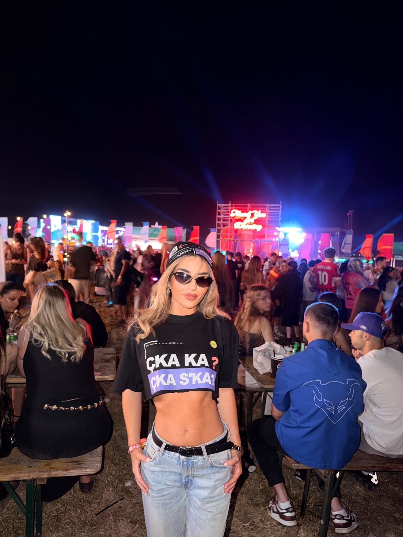 Woman wearing the RRUGA 01 T-shirt at Sunny Hill festival